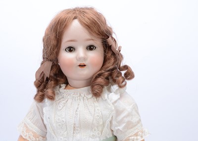 Lot 243 - A Schoenau & Hoffmeister 914 child doll