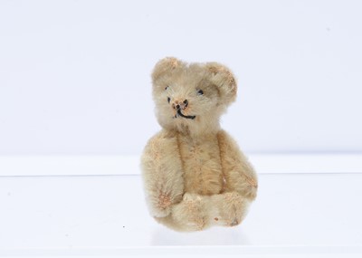 Lot 262 - A post-war miniature Schuco teddy bear