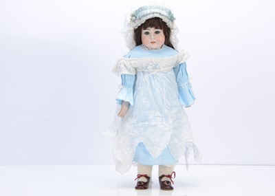 Lot 277 - A late 19th century German bisque shoulder-head doll