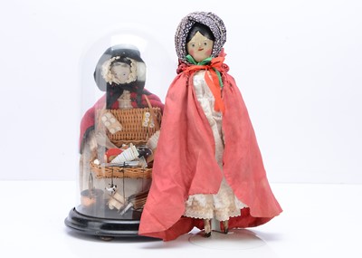 Lot 279 - Am early 20th century German pegged wooden pedlar doll