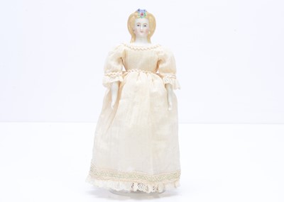 Lot 295 - A rare German bisque shoulder-head doll with butterfly hair ornament