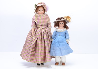 Lot 335 - Two late 19th century German composition shoulder head dolls