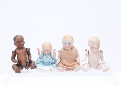 Lot 364 - Four German all-bisque dolls' house babies