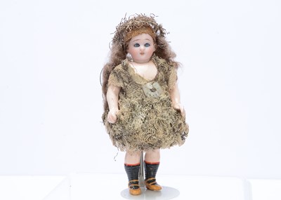 Lot 366 - A German bisque headed dolls' house doll dressed as a Christmas Fairy