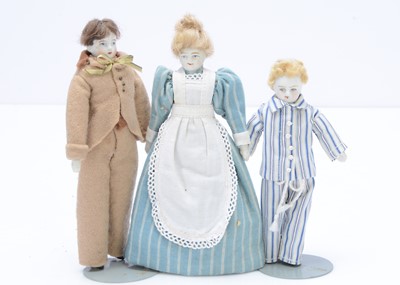 Lot 373 - Three white bisque shoulder-head dolls' house dolls