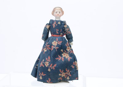 Lot 379 - A 19th century bisque shoulder-head dolls' house doll