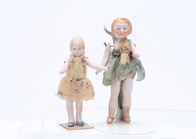 Lot 383 - Two Hertwig all-bisque dolls' house dolls with blonde painted bobbed hair