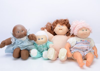 Lot 517 - Four Cabbage Patch dolls