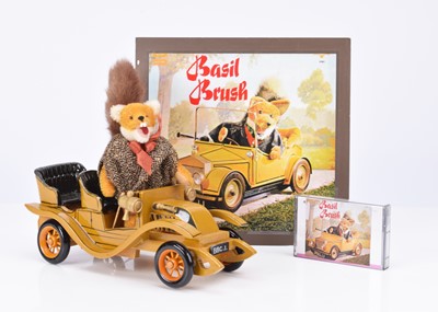 Lot 556 - An unusual small artist Basil Brush fox in model car