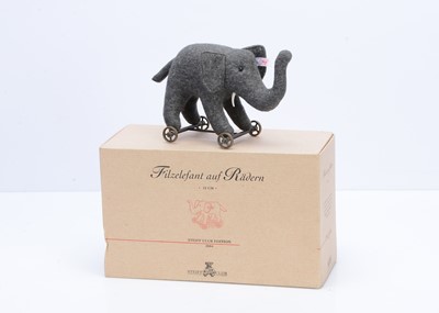 Lot 567 - A Steiff Club limited edition felt elephant of wheels