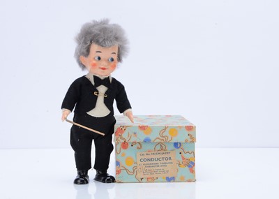 Lot 596 - A rare Pedigree hard plastic clockwork Jazzy Conductor doll