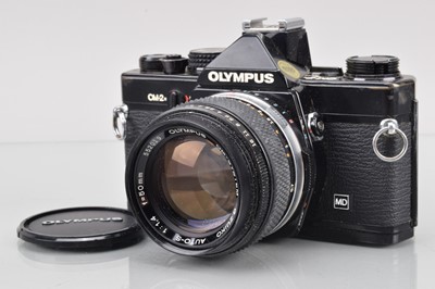 Lot 35 - An Olympus OM-2n MD SLR Camera