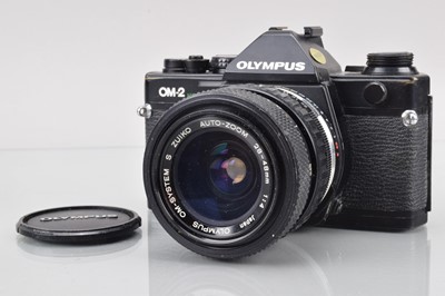 Lot 37 - An Olympus OM-2 Spot/Program SLR Camera