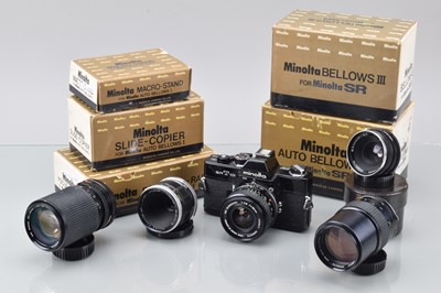 Lot 204 - A Minolta SRT 101 SLR Camera and Accessories