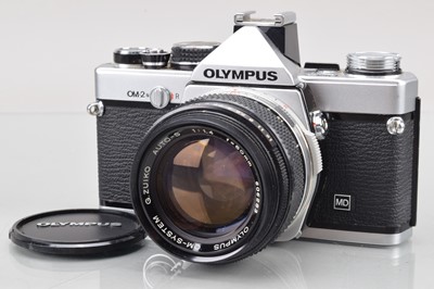 Lot 520 - An Olympus OM-2n SLR Camera