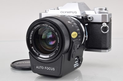 Lot 523 - An Olympus OM-30 SLR Camera