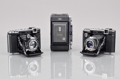 Lot 562 - Three Zeiss Ikon Folding Rangefinder Cameras