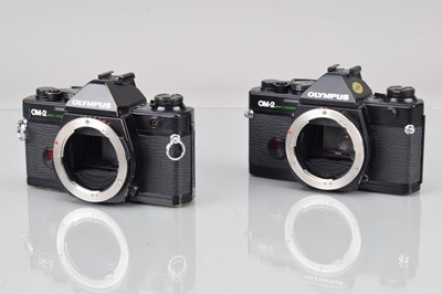 Lot 695 - Two Olympus OM-2 Spot/Program SLR Camera Bodies