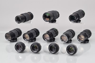 Lot 697 - A Group of Olympus OM Lenses