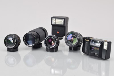 Lot 721 - A Canon Compact Camera and Various Lenses