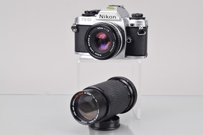 Lot 738 - A Nikon FG-20 SLR Camera