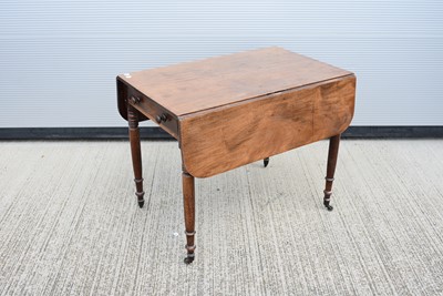 Lot 24 - A mahogany drop leaf table