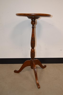 Lot 45 - A George III style oak tripod wine table