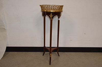 Lot 55 - A French Empire Style ormolu mahogany tripod jardiniere or pot stand