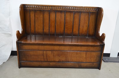 Lot 57 - A good reproduction oak monks bench