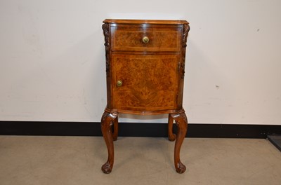 Lot 58 - A French style walnut bedside cabinet