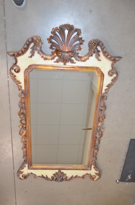 Lot 67 - A reproduction George II parcel gilt 'Palladian Style' wall mirror