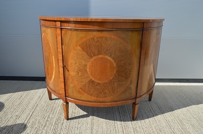 Lot 101 - A mid-20th Century demi lune mahigany and satinwood marquetry commode cabinet