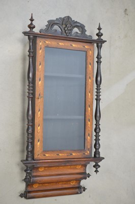 Lot 104 - A wall-mounted glazed collector's cabinet