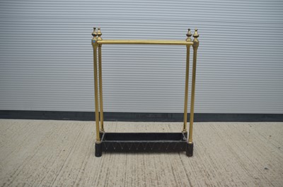 Lot 107 - A lacquered brass and cast iron stick/umbrella stand