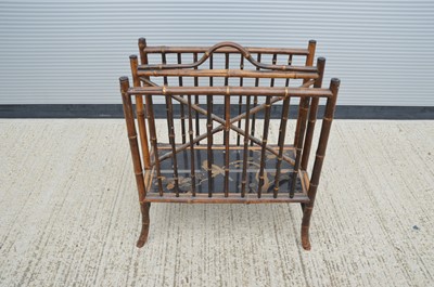 Lot 111 - A bamboo and laquer magazine rack