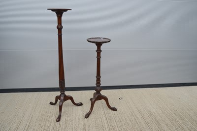 Lot 118 - Two early 20th Century mahogany torcheres or lamp tables