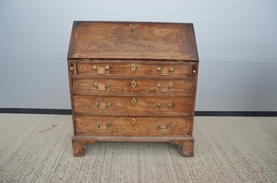 Lot 129 - An 18th Century Georgian English country oak and pine bureau