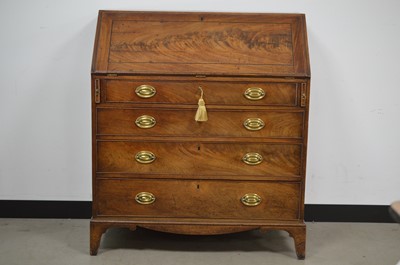 Lot 133 - A George III mahogany bureau or writing desk