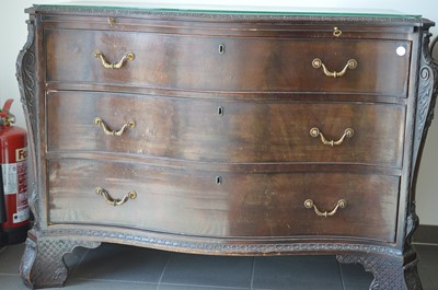 Lot 139 - A George III Chippendale style dark mahogany bow fronted commode