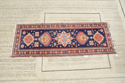 Lot 145 - A Middle Eastern 'kazak' design wool runner