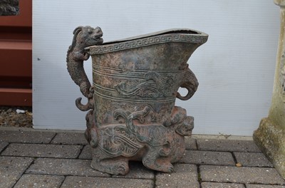 Lot 170 - A verdigris bronze planter