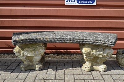 Lot 172 - A semi-circular reconstituted stone garden seat or bench