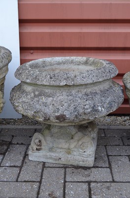 Lot 175 - A large weathered reconstituted stone mortar-shaped planter