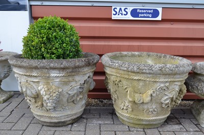 Lot 176 - A large pair of reconstituted stone planters