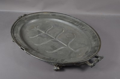 Lot 189 - A large 19th Century pewter meat warming platter or dish