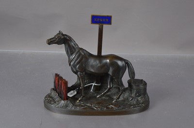 Lot 205 - A bronze desk stand figure of a horse