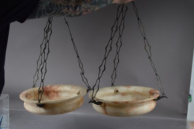 Lot 210 - A pair of late 19th-early 20th Century clarved alabaster plafonnier hanging ceiling shades.