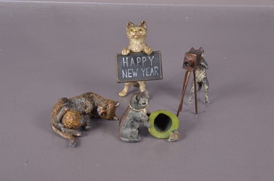 Lot 213 - Four cast metal Cat figures