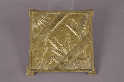 Lot 217 - An Aesthetic style brass trivet stand by Thomas Jeckyll (1827-1881)