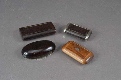 Lot 282 - A group of four 19th Century treen pocket snuff boxes